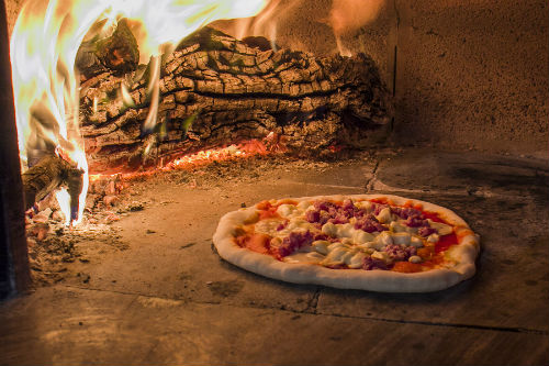 MobilePizza-Chef offer Artistian wood-fired pizza Capricciosa