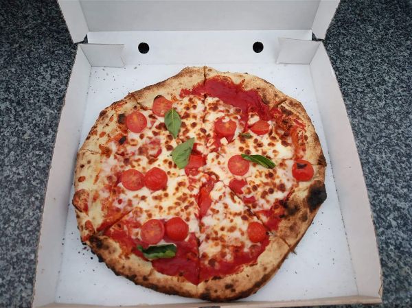 Vintage pizzeria on wheels. Mobile pizza catering for weddings, parties and events=